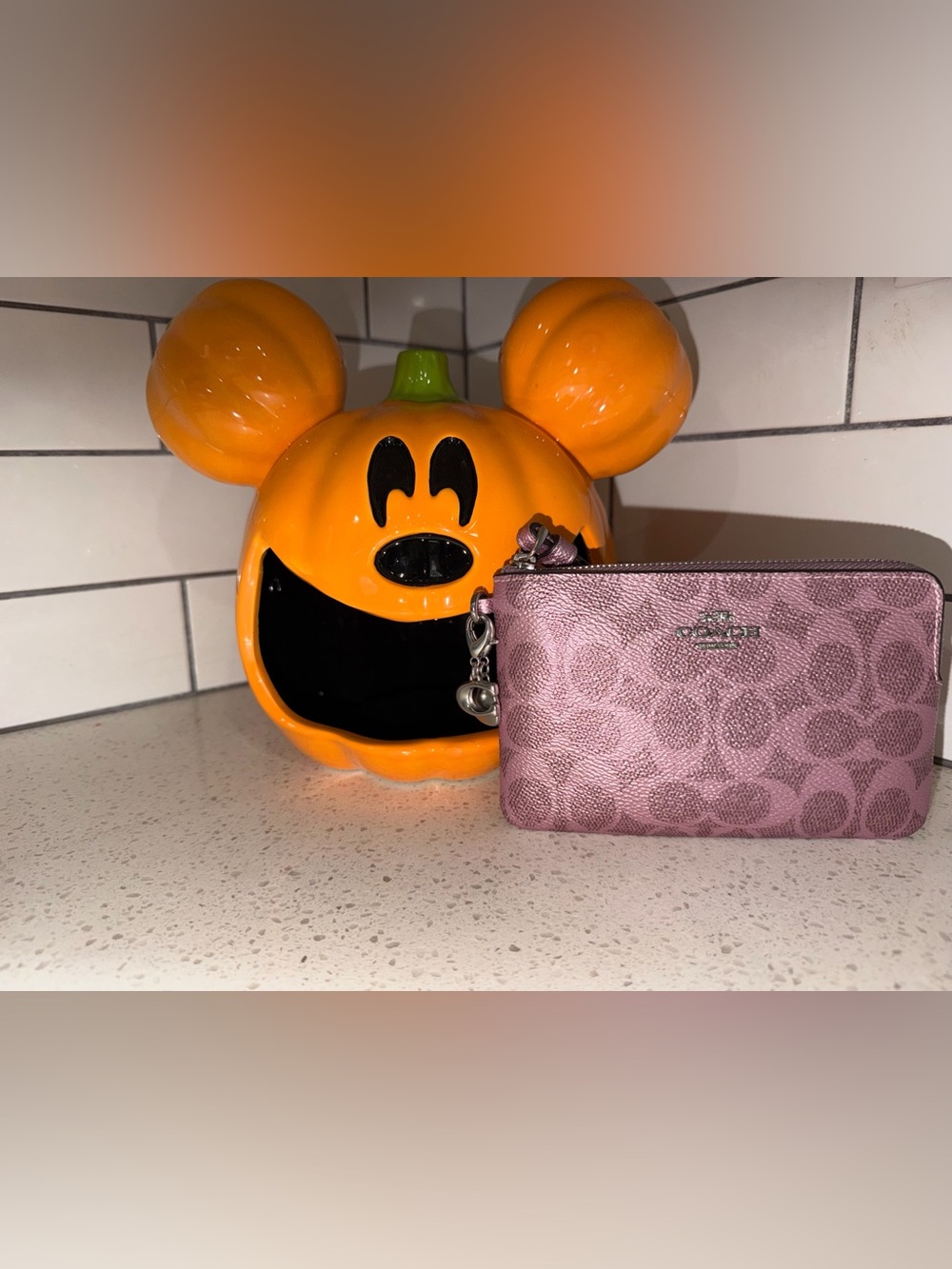 Metallic pink coach wristlet